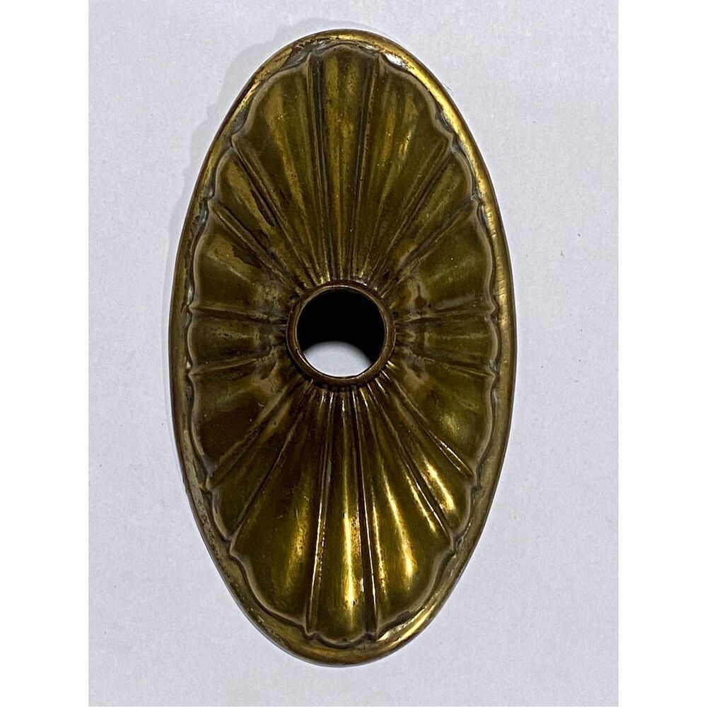 vintage brass stamped fluted oval sconce backplate